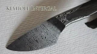 Damascus Keyhole integral knife handforged using a flypress