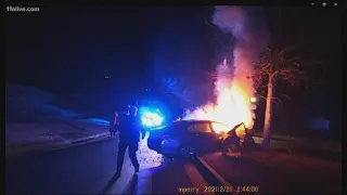 Dramatic rescue from fiery crash caught on video