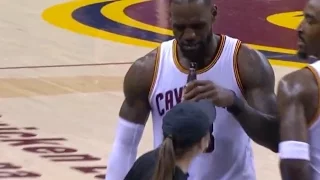 LEBRON PRETENDS TO DRINK FANS BEER AFTER FOUL VS. RAPTORS!