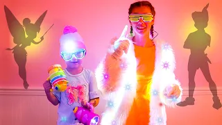 Nastya and Mia plays with shadow puppets and glowing toys