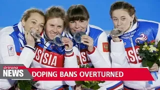 Russian athletes have doping bans overturned