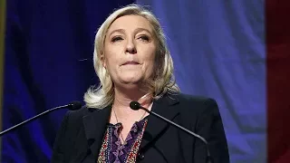 France's Le Pen charged over EU funding scandal