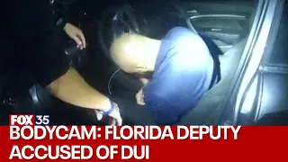 Bodycam appears to show Orange County deputy slumped over in seat during DUI arrest