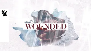 Ferry Corsten & Morgan Page feat. Cara Melín - Wounded (Official Lyric Video)