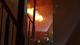 Firefighter protects himself against a backdraft!