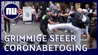 Demonstranten vallen agenten aan bij coronaprotest in Den Haag | NU.nl