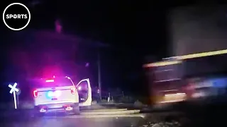 Cops Charged After Train Hits Car With Suspect Inside (UPDATE)