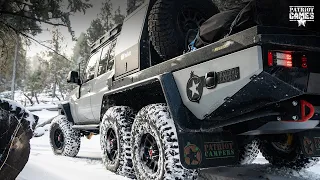 LandCruiser 6x6 Tows a Camper Trailer Through Snowy Big Bear Mountain California