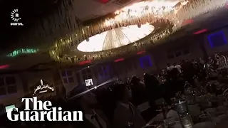 Chandelier catches fire killing over 100 people at a wedding in northern Iraq