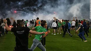 Chaos erupts as angry fans storm the pitch following the Saint Etienne's relegation to Ligue 2