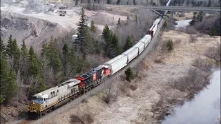 Awesome 4K Aerial View! Long & Fast Freight Train CN 507 Passing Rock Quarry near Calhoun, NB