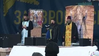 Kiev protesters find faith to fight on