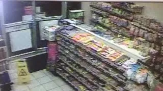 Raw surveillance video: Robbery suspects enter Longmont convenience store