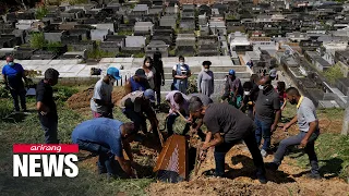 People in Petropolis grief as mudslide death toll in Brazil rises to 104