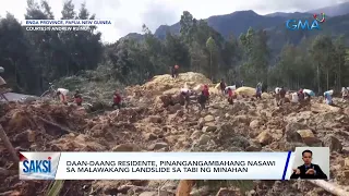 Daan-daang residente, pinangangambahang nasawi sa malawakang landslide sa tabi ng minahan | Saksi