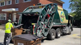 groot econic garbage truck on cascades