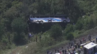 Bus carrying high school students to band camp crashes, killing 2 and seriously injuring others