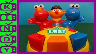 Sesame Street Singing Pop-Up Toy. Elmo, Ernie, Cookie Monster. Sesame Street Toys. KindyKids TV.