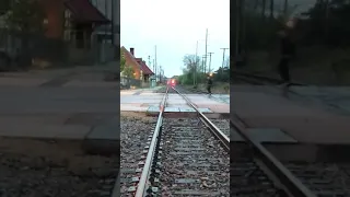 Orange tracks + eastbound Amtrak train