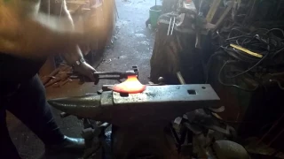 Forging a bearded axe by Finin Liam Christie blacksmith from Ireland