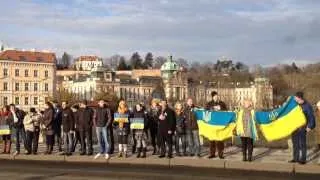 Ukrainians singing a national anthem in Prague