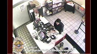 Surveillance video captures armed robbery at Dunkin' Donuts