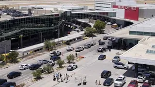 Officials say a woman opened fire in Dallas airport; cop shot her