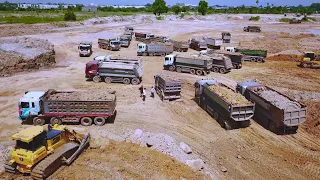 Great ACTION! Machinery working at landfill up construction dump trucks moving rock soil & Bulldozer