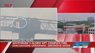 Crews battle large fire in SouthPark area; crane worker rescued