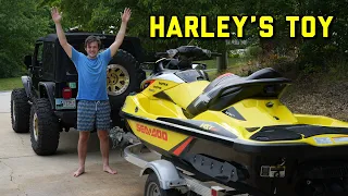 Learning how to Wake Board and Tube behind his new Sea-Doo RXT X 260