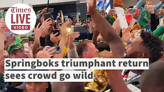 Packed crowd goes crazy as Springboks return from Rugby World Cup with trophy
