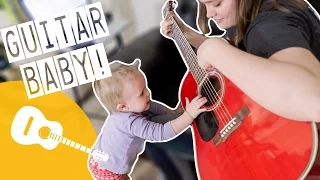 BABY PLAYS GUITAR