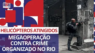 Rio: dois helicópteros da polícia são atingidos em megaoperação contra crime organizado