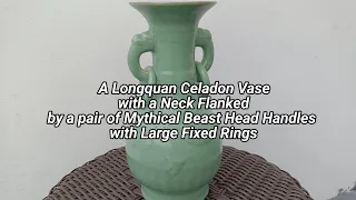 A longquan Celadon Vase with a Neck Flanked by a pair of Mythical Beast Head Handles