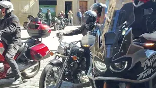 bikers leaving Olite Spain