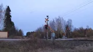 Intercity Ic 884 passed SAUVAMÄKI (Km.0427+0052) level crossing in Hankasalmi, Finland