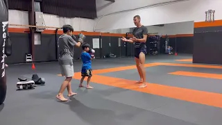 Kenny and brother practice Muay Thai with Adrien Rubis