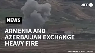 Armenian and Azerbaijani forces exchange heavy fire killing dozens | AFP