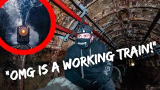 CRAZIEST UNDERGROUND EXPLORE YET! A WORKING TRAIN SURPRISES US!