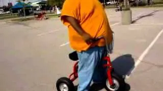 arkansas guy on a tricycle takes a hard fall