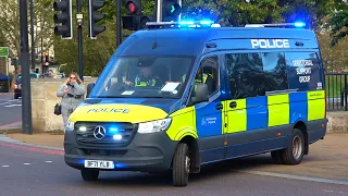 Metropolitan Police + City Police van convoys through London