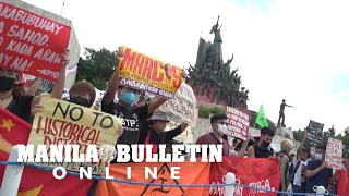 Protesters commemorate the 37th anniversary of EDSA People Power Revolution