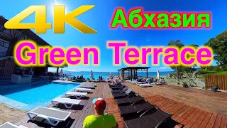 Территория отеля Green Terrace с палкой на плече в Абхазии, Новый Афон