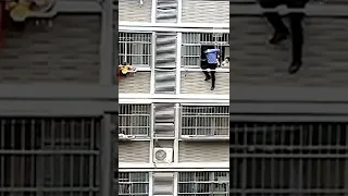 Neighbor Rescues Toddler Hanging Out of Third-Story Window