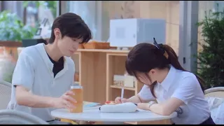 The boss buys breakfast for his sweet wife and stares at her doing her homework