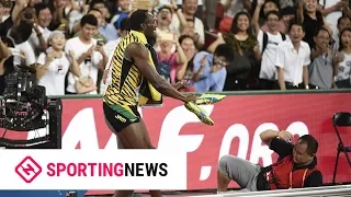 Camera guy CRASHES Into Usain Bolt