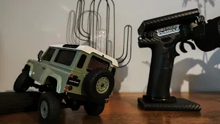 Kyosho Mini-Z 4x4 Land Rover Defender Heritage Edition climbing the Couch | RCO