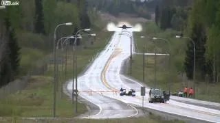 F-18 taking off from highway