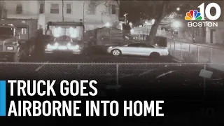 Video shows pickup truck going airborne before crashing into Brockton home, landing on cars