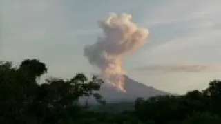 Mexican volcanoes spew smoke and ash